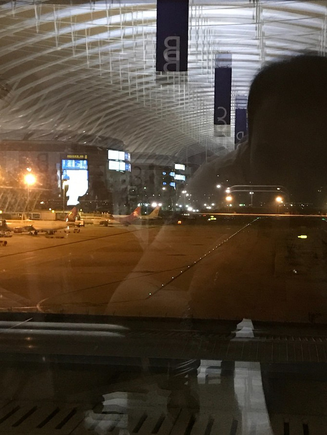 来一张登机前照片