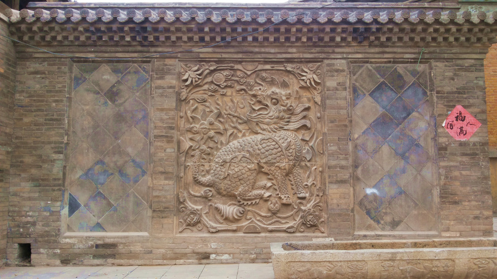 钱庄墙上的砖雕,"麒麟". 太原市阳曲青龙镇村